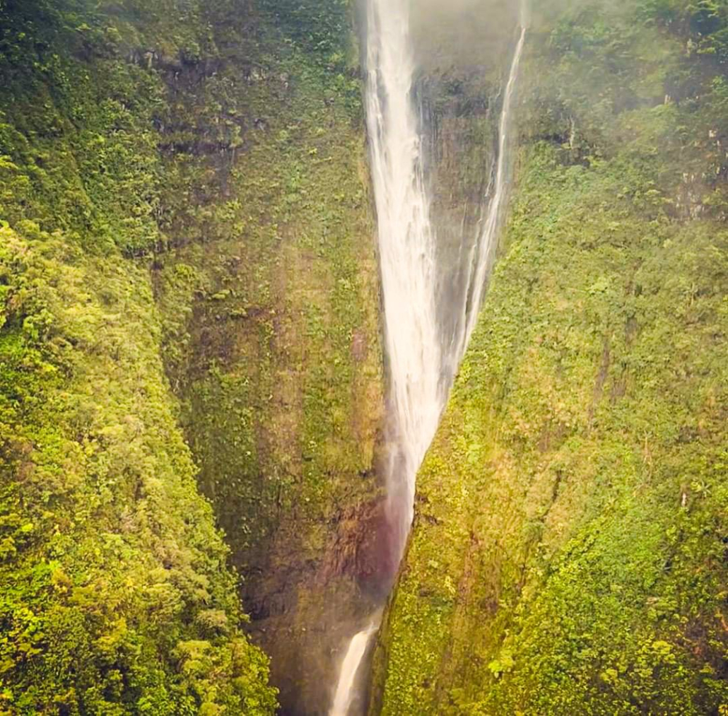 Flying Next To Draping Waterfalls Maui Sunshine Helicopters