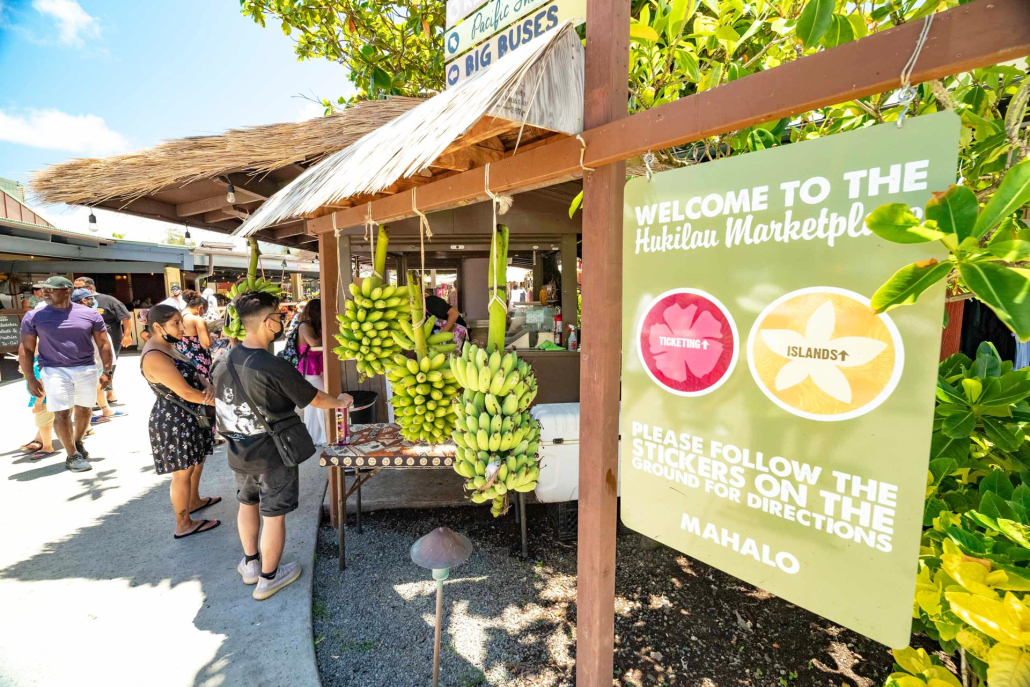 Beautiful Day At Polynesian Cultural Center Hukilau Marketplace Visitors Bananas And Sign Oahu