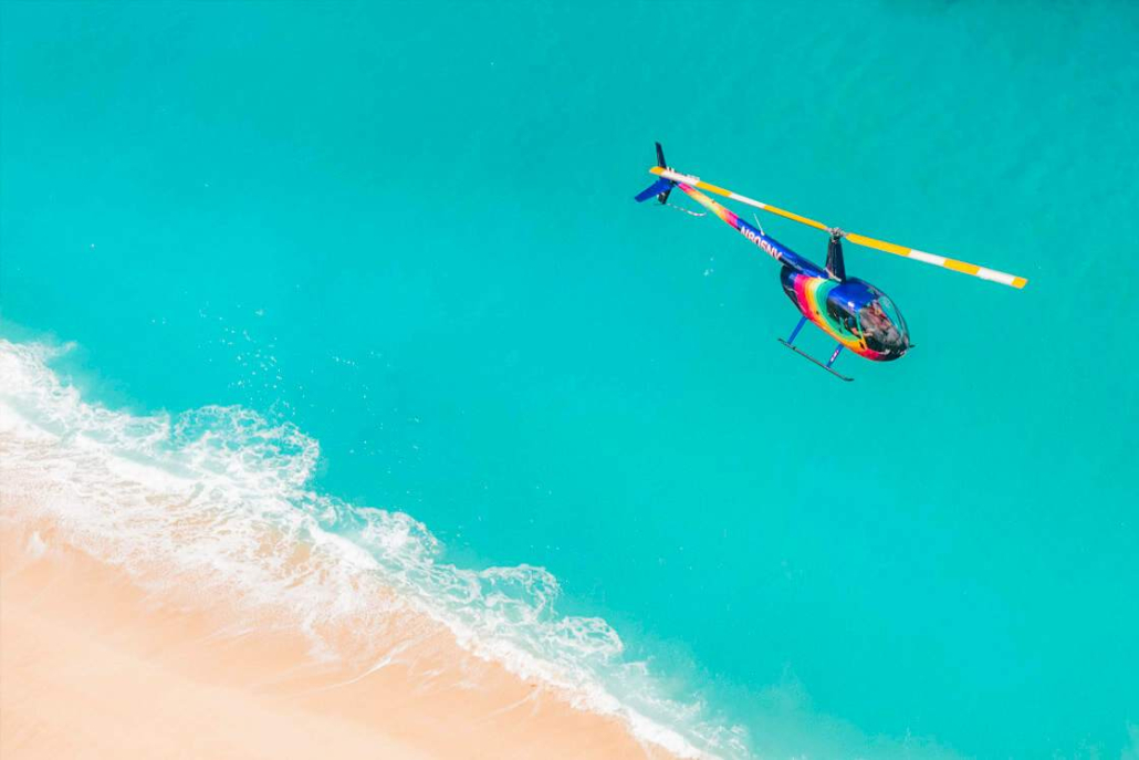 Rainbow Helicopters Flying Above Waikikis Famed Beaches